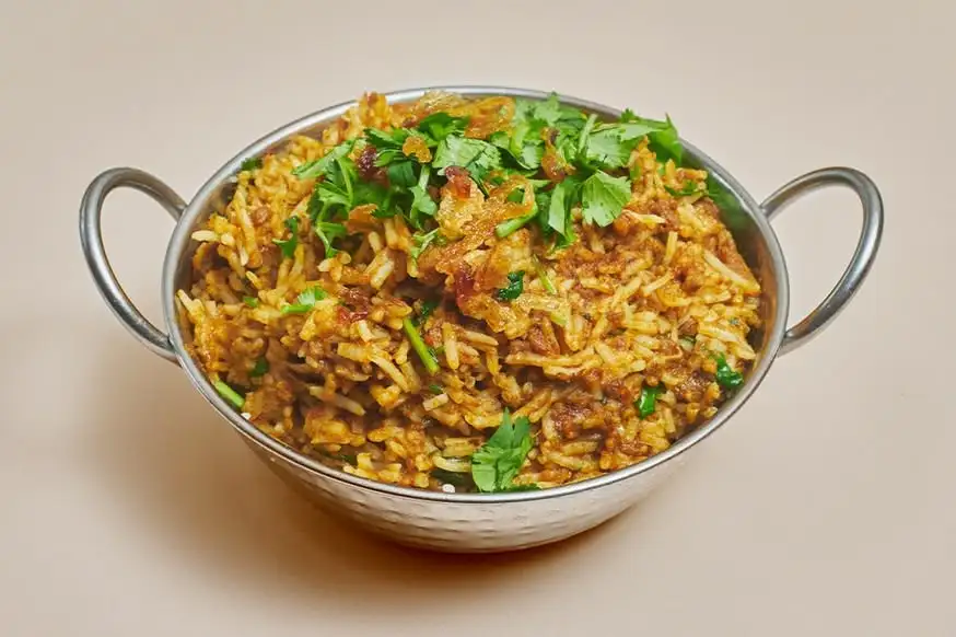 Lamb and shrimp vindaloo with basmati rice